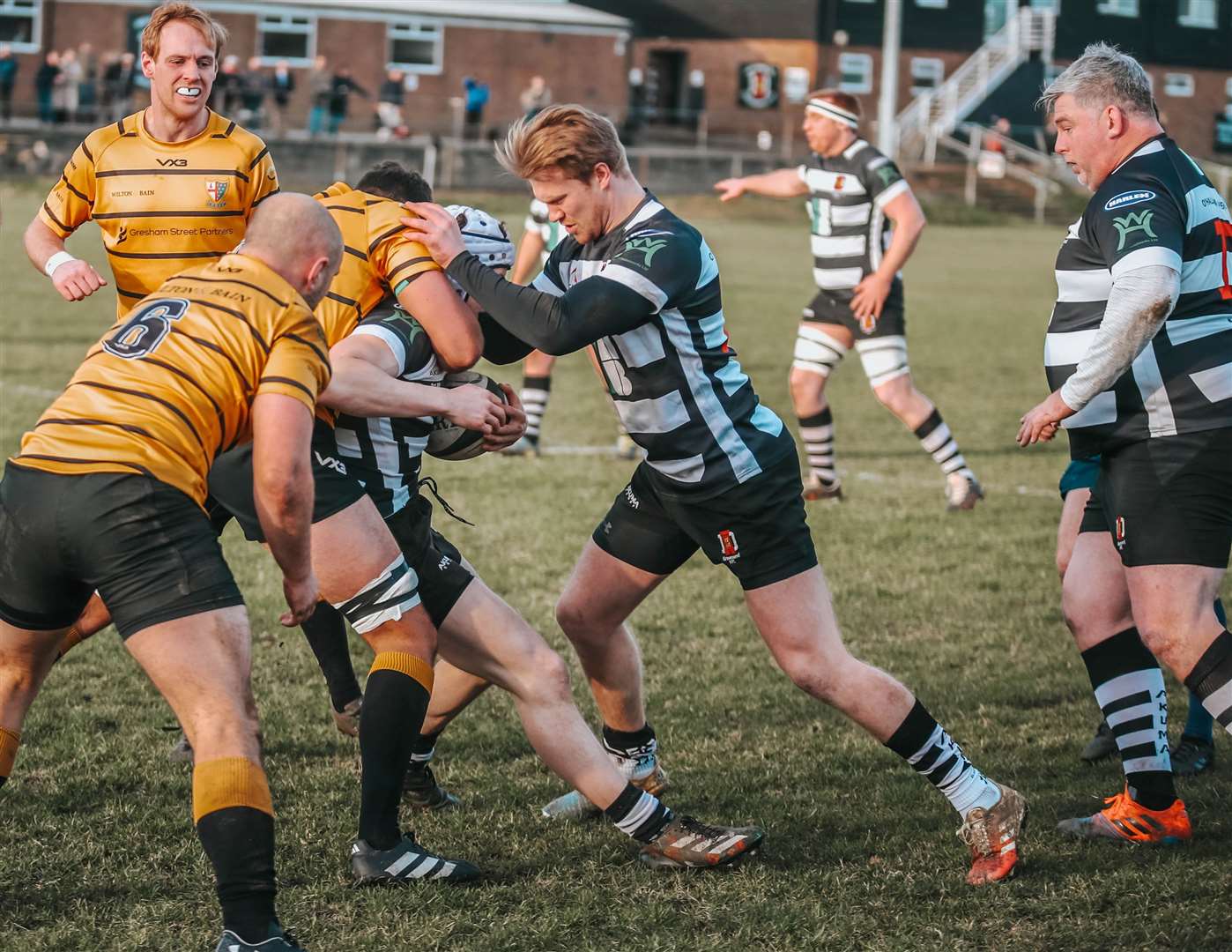 Gravesend’s Harvey Dean is challenged by London Cornish while Andrew Cooke, centre, and Jamie Forsyth, right, provide support. Picture: jp_photographeruk