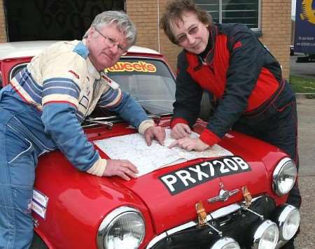 Bill Richards, left, and Dr John Morrow planning their route