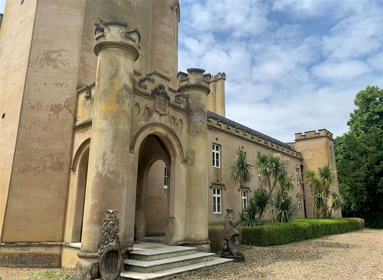 Two stone lions guard the entrance at Oxney Court near Dover