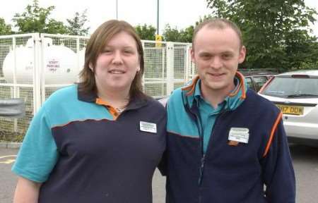 BRIGHT SPARK: Cashier Hayley Sparkes and her manager Mike Hicks. Picture: JIM RANTELL