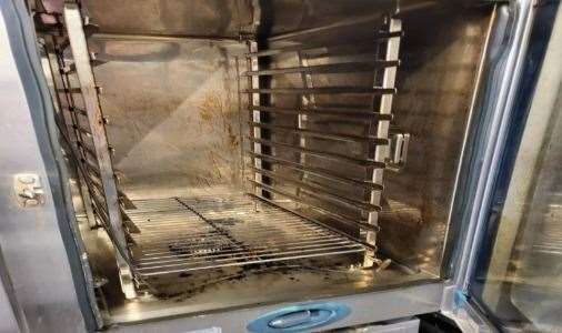 The supermarket's café oven was told it needed a "thorough clean"