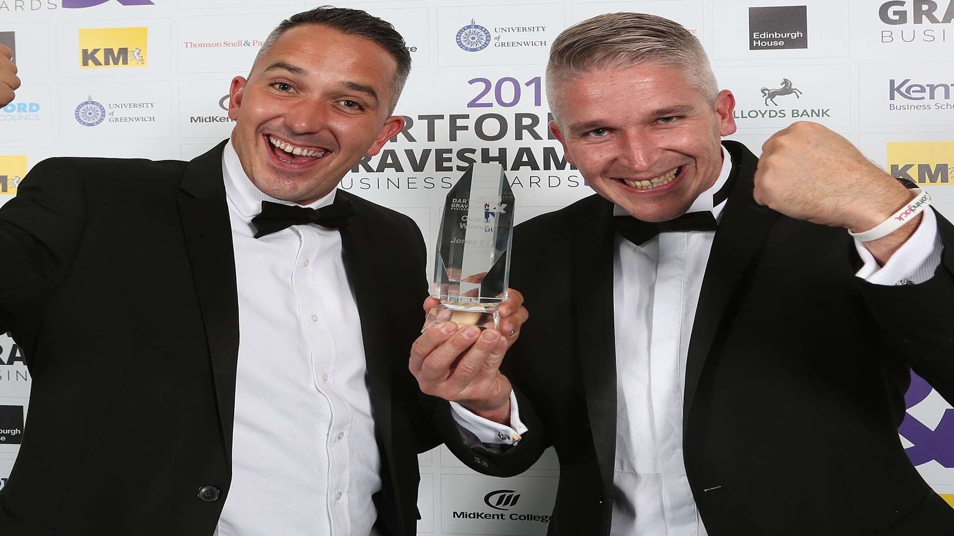 Brothers and business partners Chris and Bradley Jones with their Business of the Year trophy for their firm Jones FM