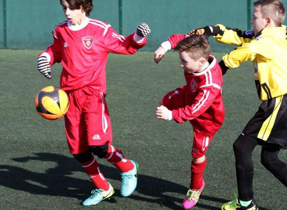 Antonio, Sonnie and Thomas in action on the pitch