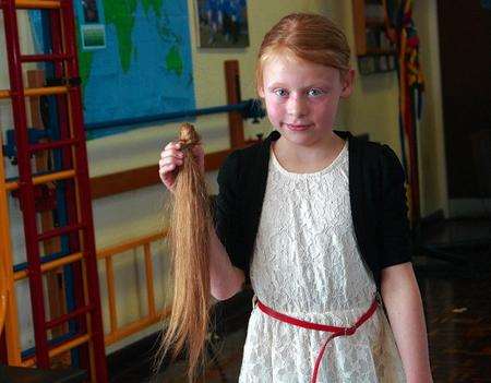 Gracie Honeysett had her long locks cut for charity