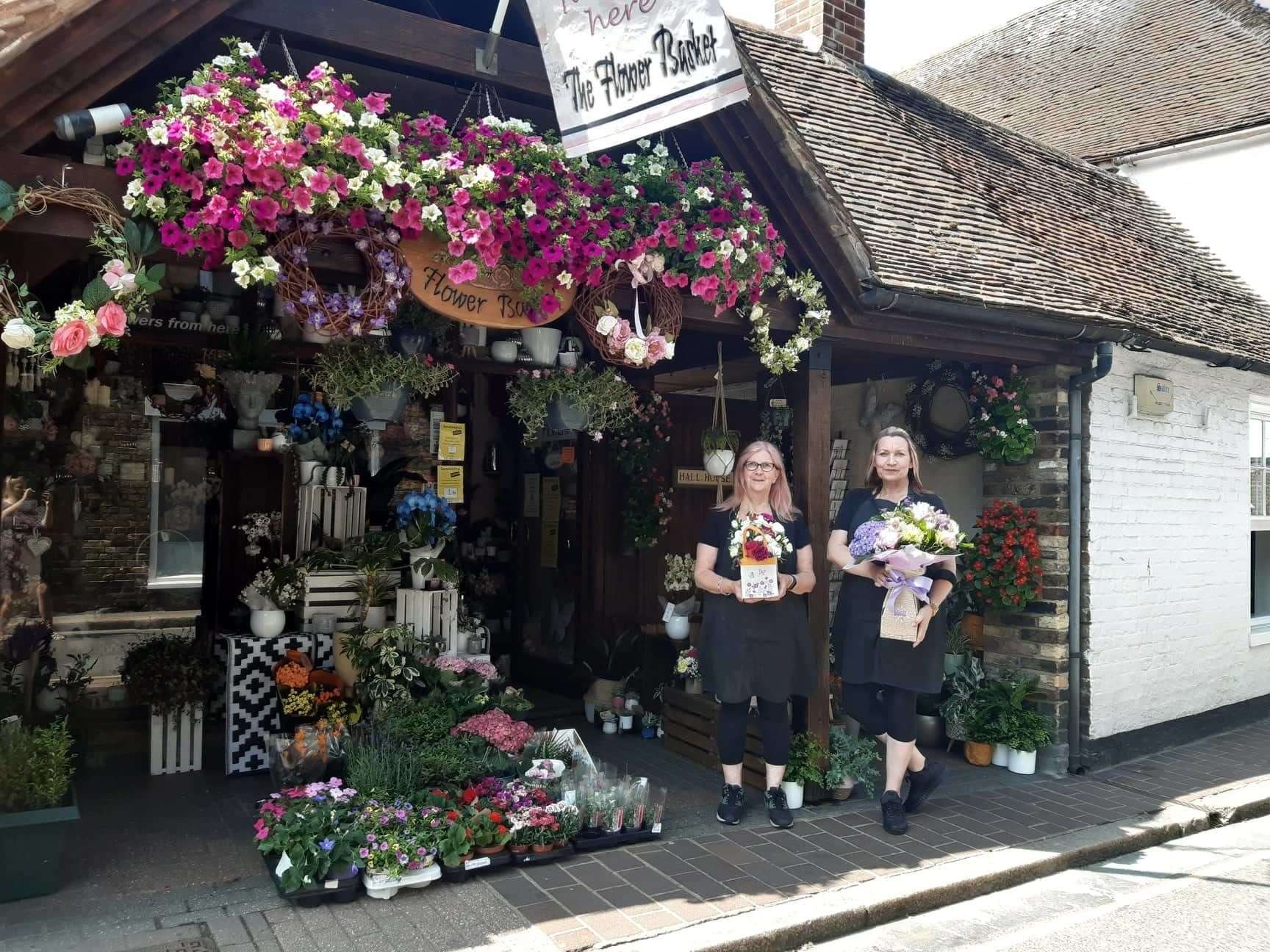 Carina Van Der Plas, owner of the Flower Basket with Margaret Thomas