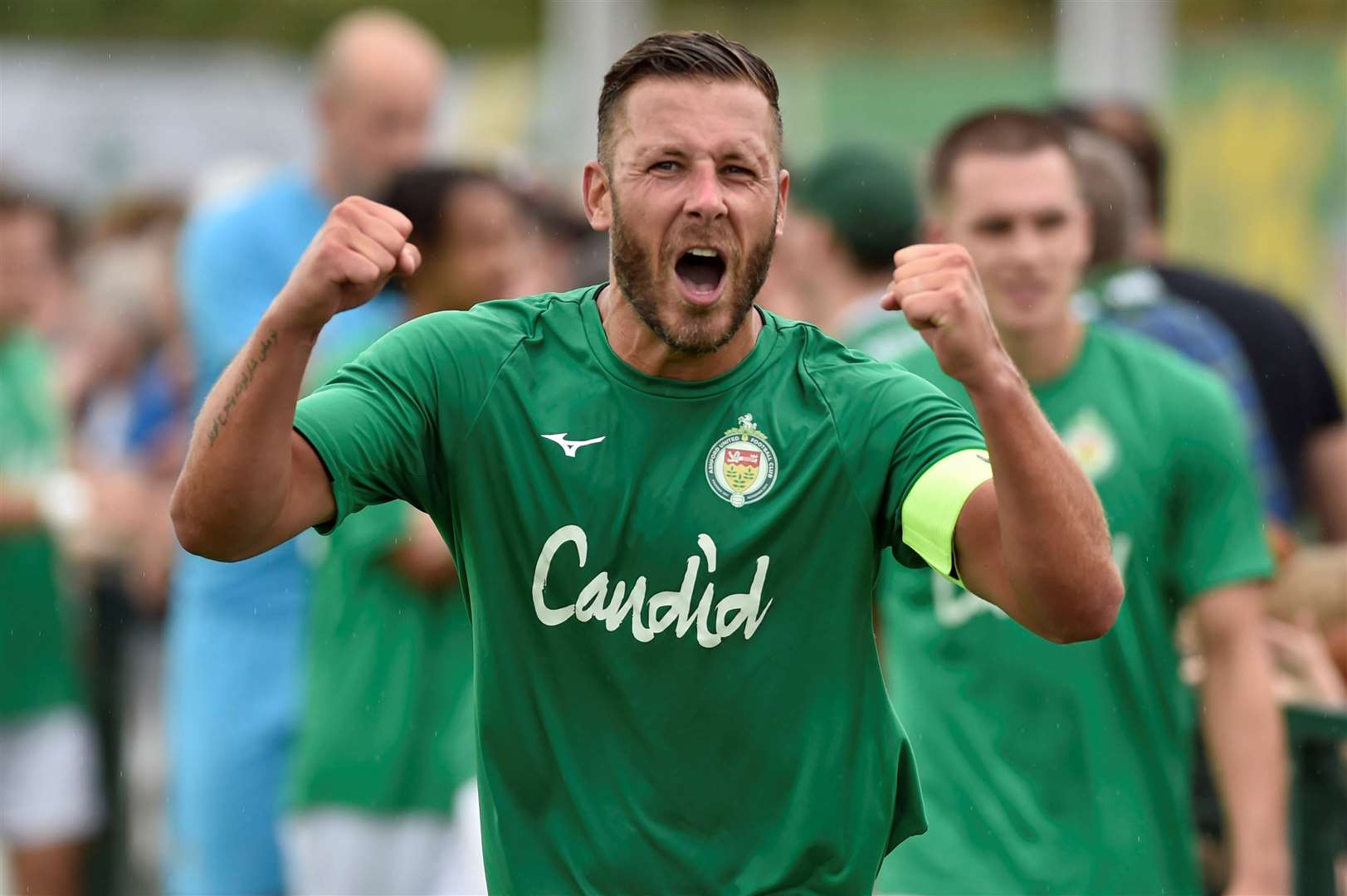 Ashford skipper Craig Stone celebrates their FA Cup victory over Egham. Picture: Ian Scammell