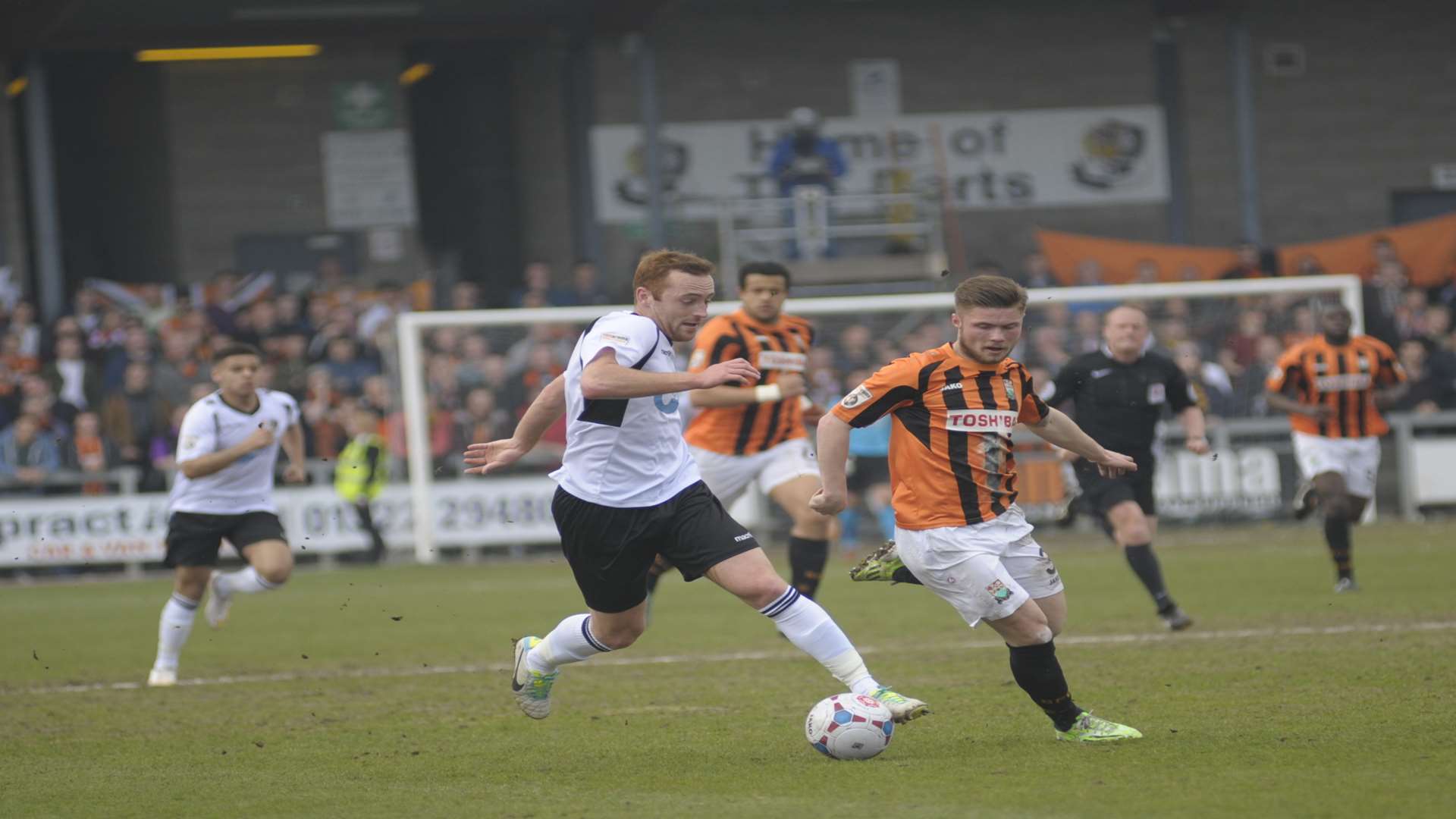 Harry Crawford on the run for Dartford against his former club Barnet Picture: Steve Crispe