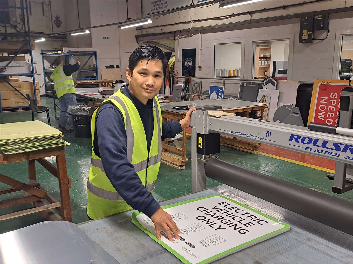 Former Gurkha soldier Tirthraj Thapa working in the sign shop