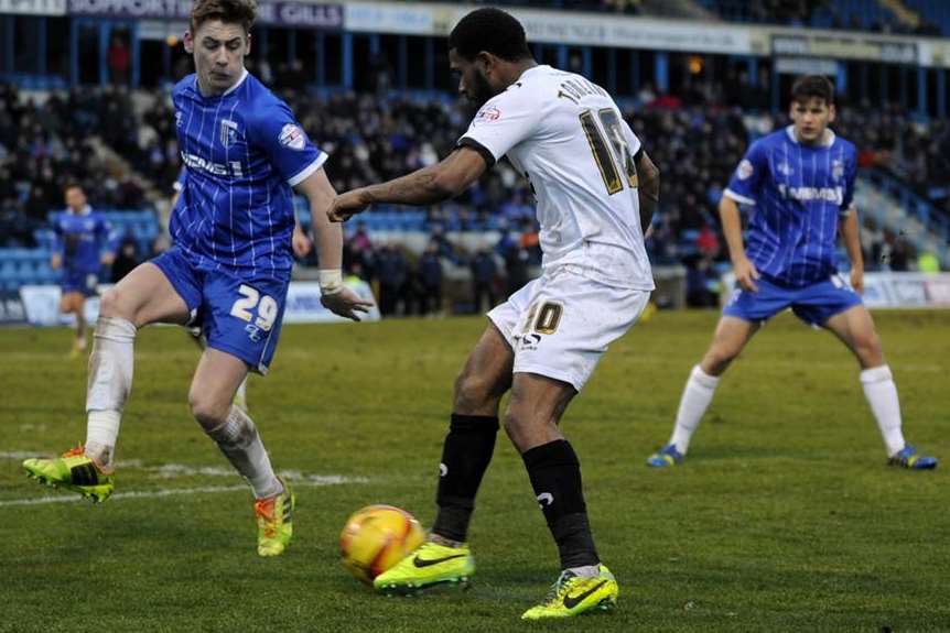 Elliott Hewitt closes down former Gills player Gavin Tomlin. Picture: Barry Goodwin