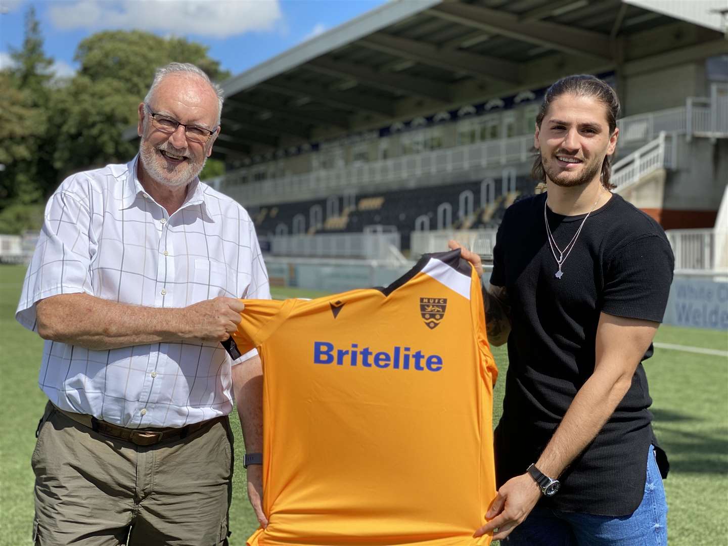 Maidstone chief executive Bill Williams welcomes Kreshnic Krasniqi to the Gallagher Stadium