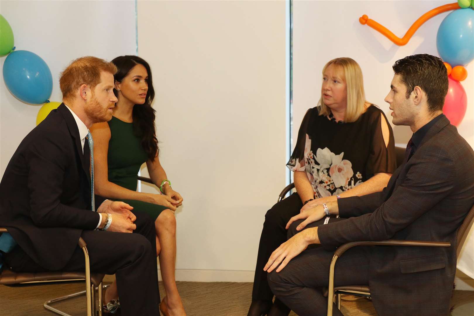 Rhys, 17, with his mother speaking to the Duke and Duchess of Sussex (19815571)