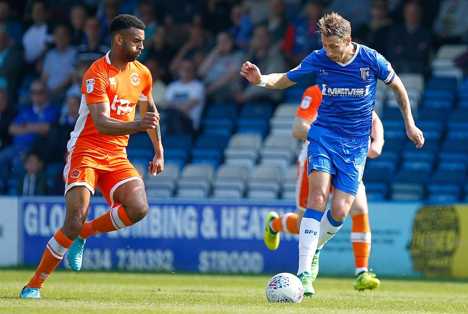 Lee Martin gets stuck in for Gills Picture: Andy Jones