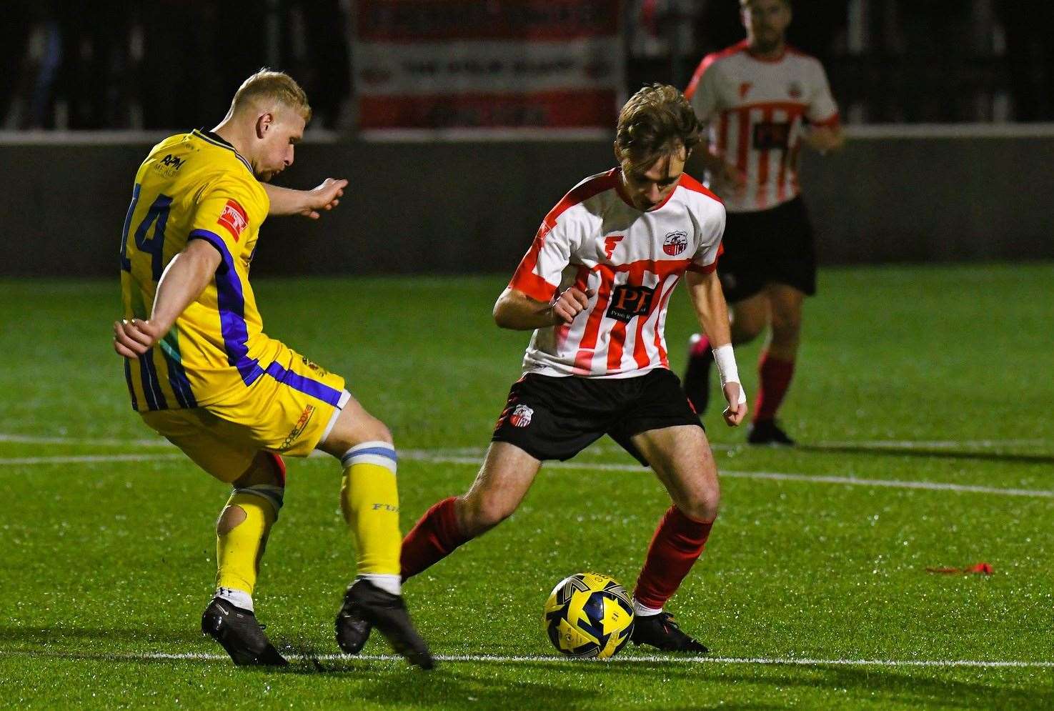 The teams battle for a loose ball in midfield. Picture: Marc Richards