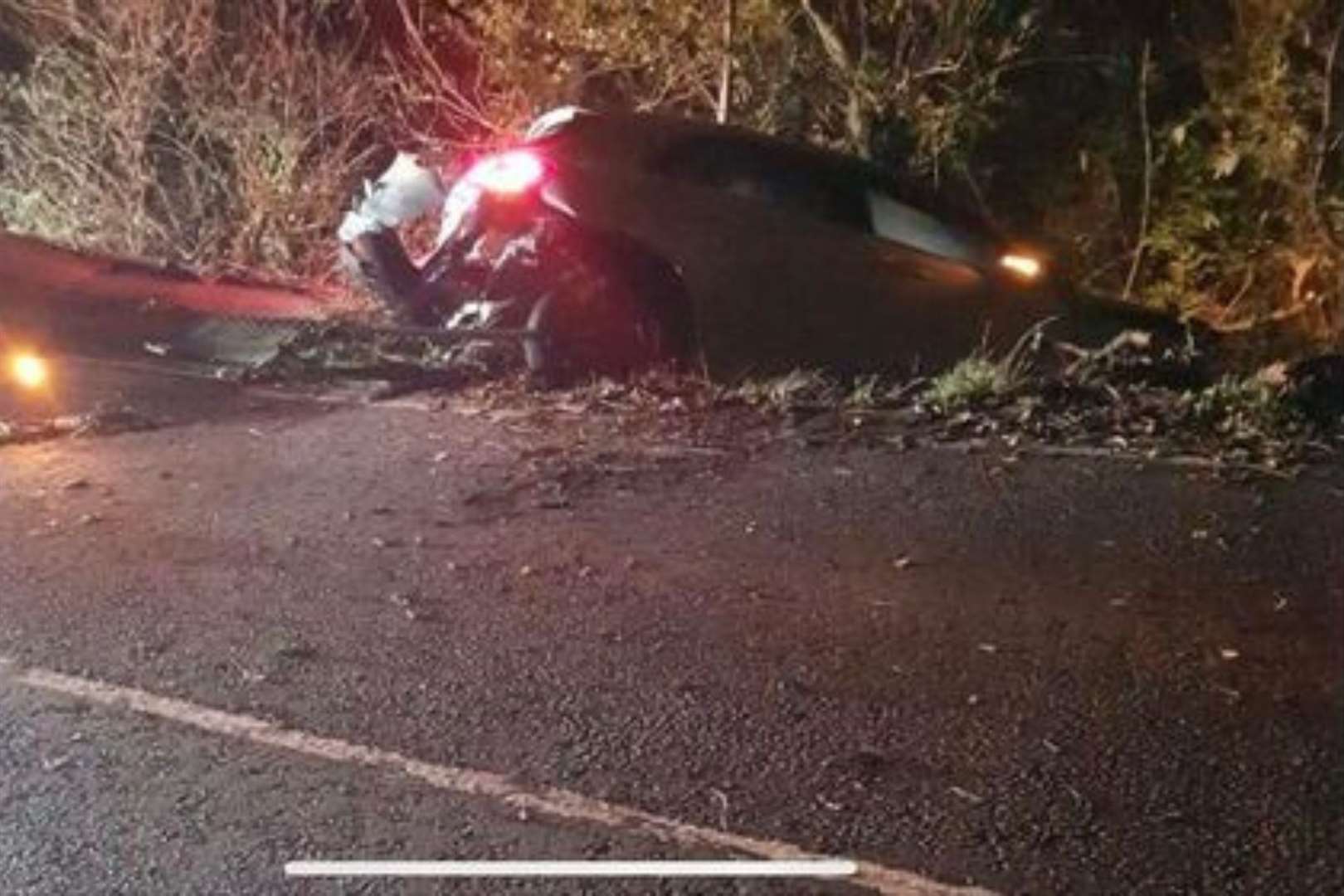 The car was left several feet into a ditch at the side of the road. Picture: Kelly Marie Algar