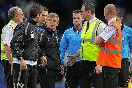 Andy Hessenthaler and Nicky Southall let referee Paul Tierney know their feelings at the full time whistle. Picture: Barry Goodwin