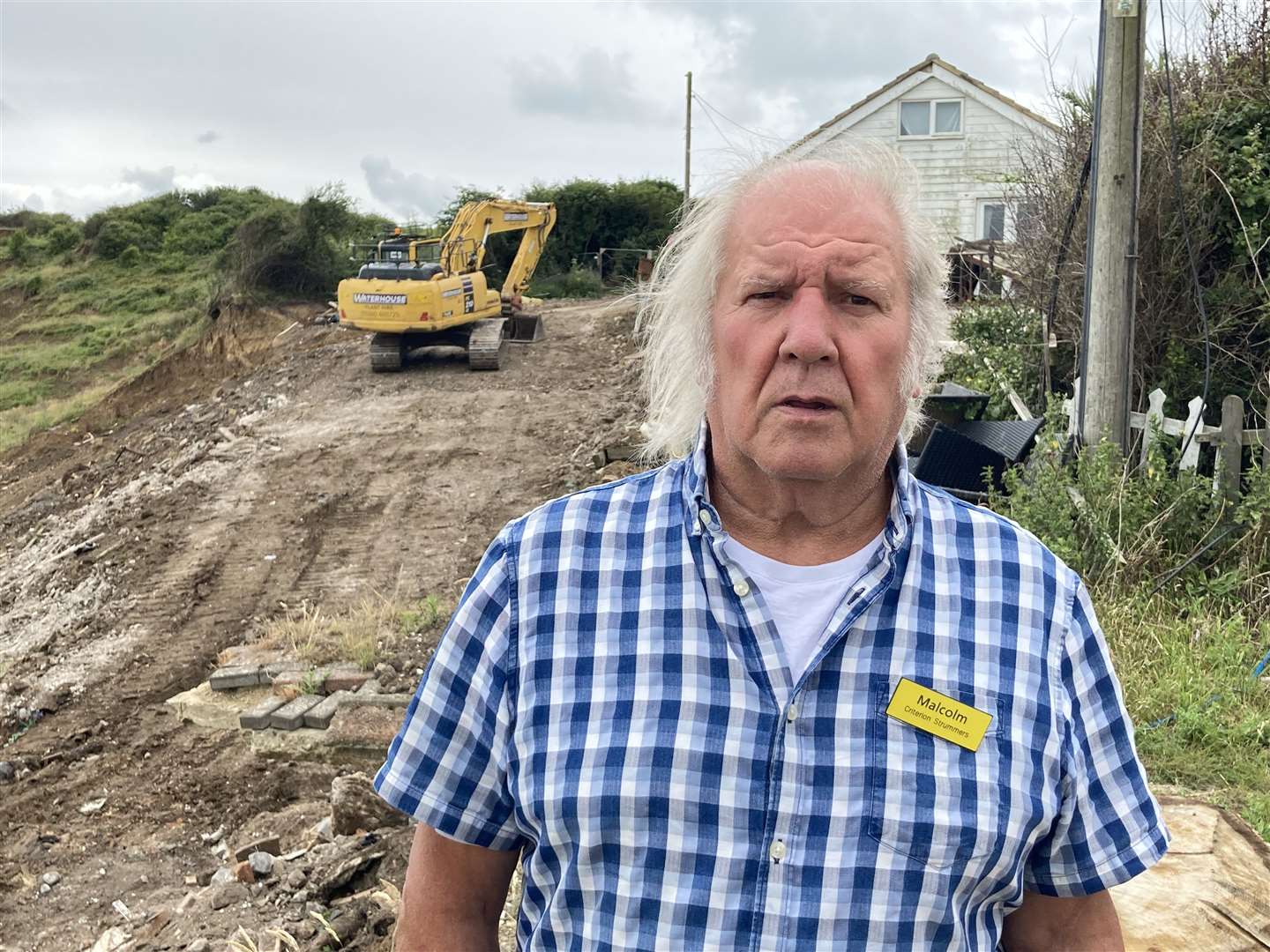 Malcolm Newell at work on the cliffs at Surf Crescent, Eastchurch