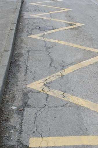 Zig-zag lines outside a school.