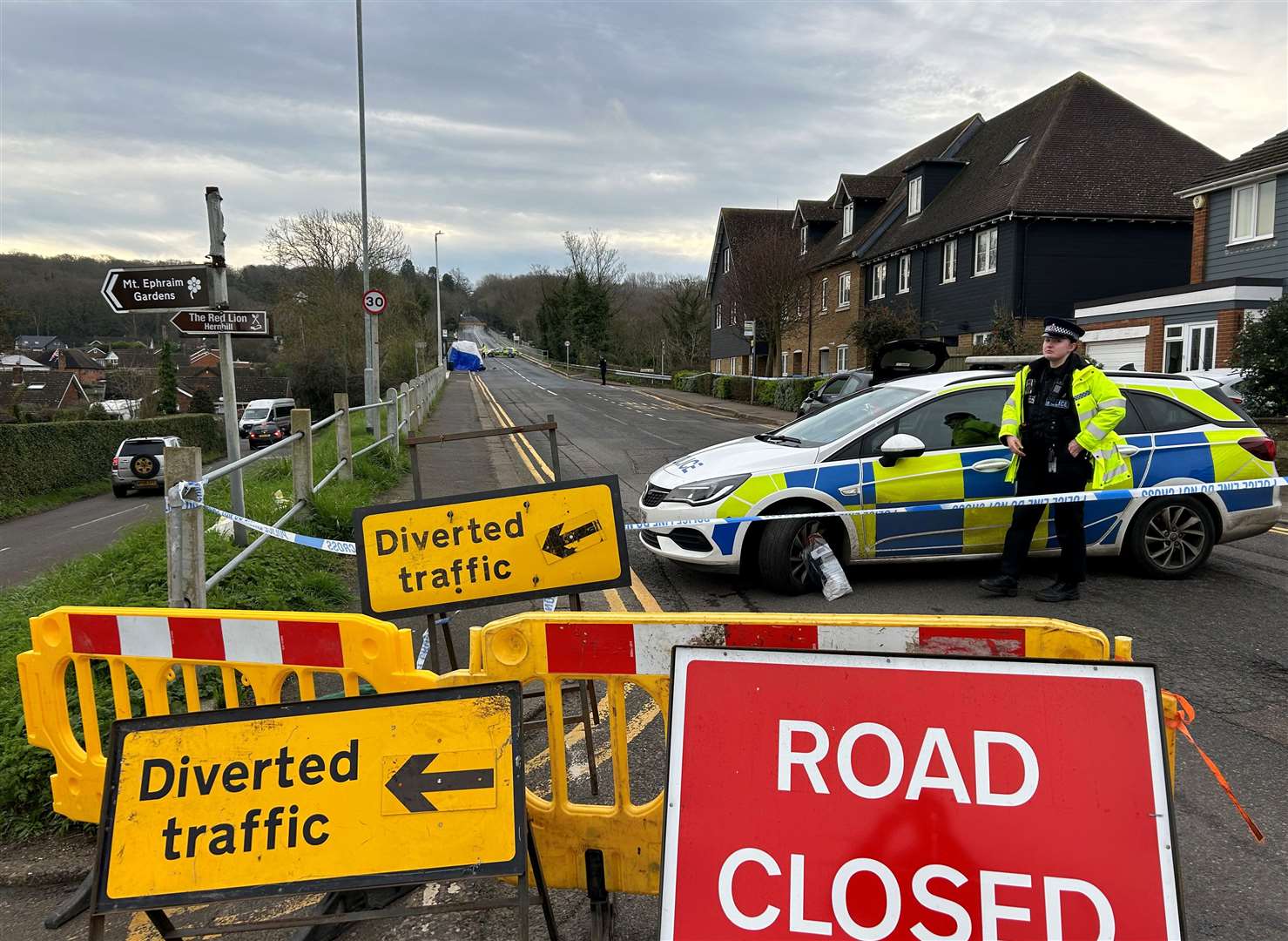 Forensics officers working at the scene outside the pub on March 14 - the day after the incident