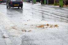 Sewage bubbles up out of drains in Halfway Road, Halfway, Sheppey during heavy rain