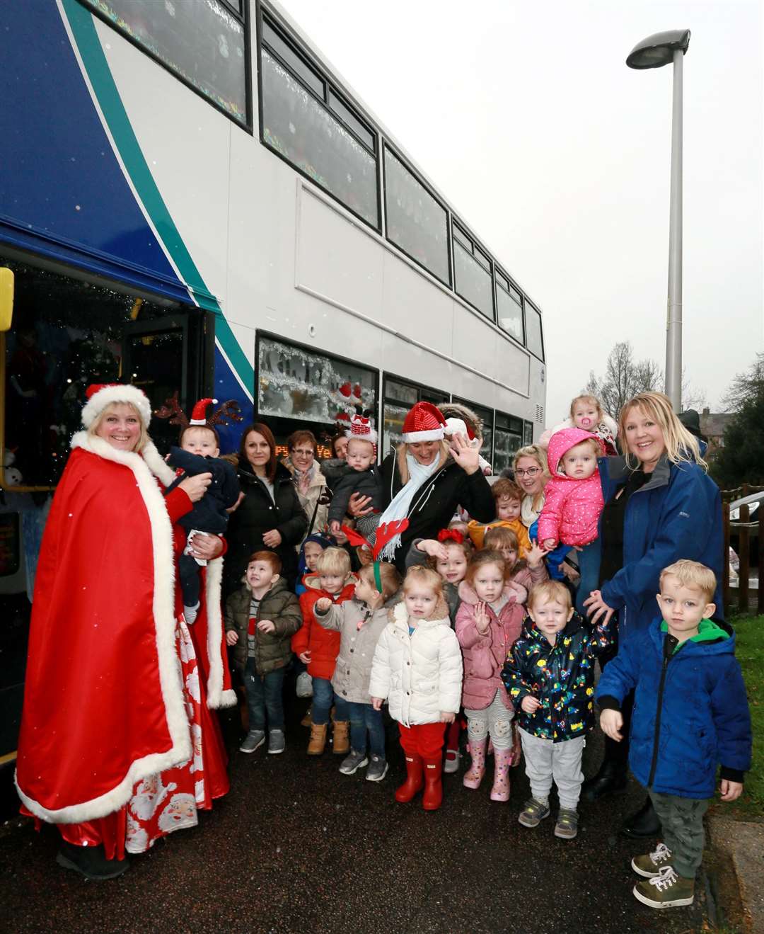 Tracy, children and parents of Thamesview Nursery. Picture: Phil Lee