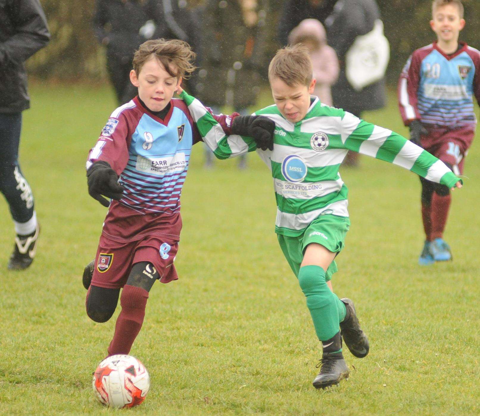 Wigmore Youth Whippets under-9s, left, take on New Ash Green Grasshoppers Picture: Steve Crispe