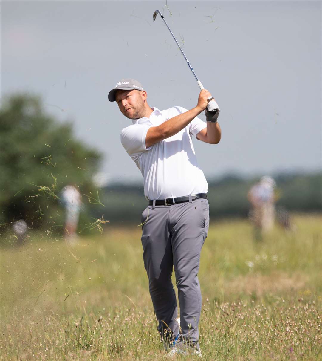 Littlestone's Daniel Brown plays from the rough on the 12th. Picture: Ady Kerry