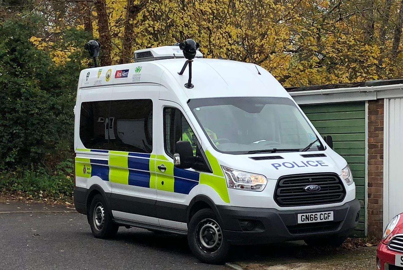 A police van in High Trees off Lees Road