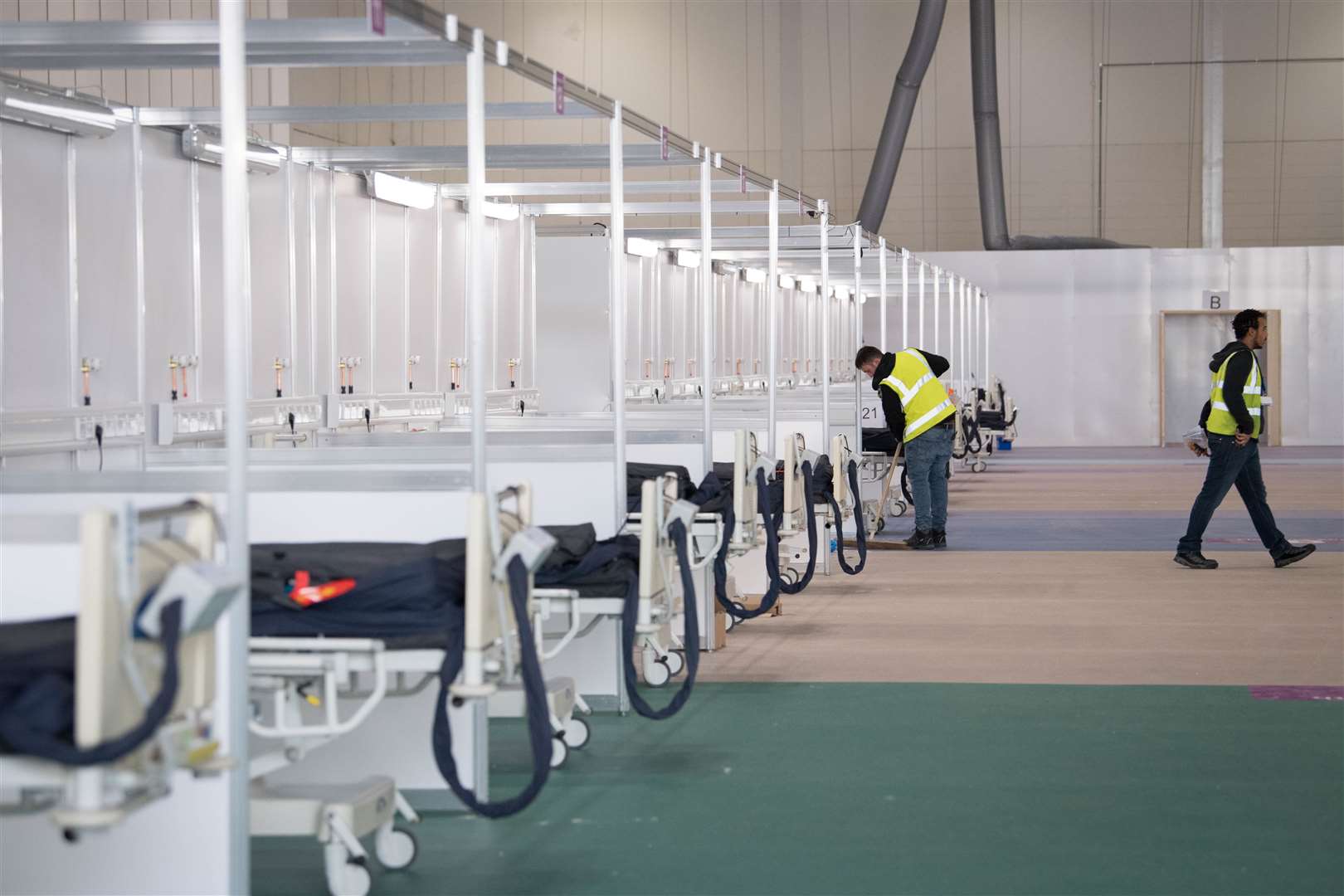 Soldiers and private contractors helped to turn the ExCel centre in east London into the new hospital (Stefan Rousseau/PA)