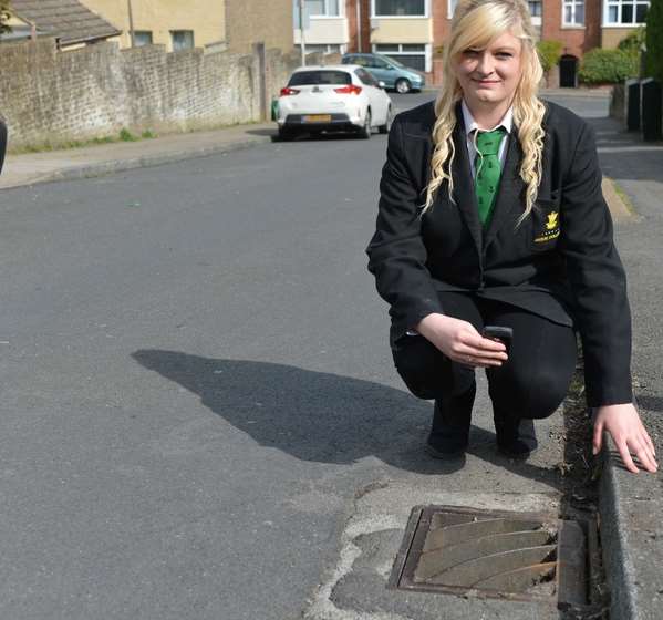 Ella Birchenough at the storm drain. Picture: SWNS