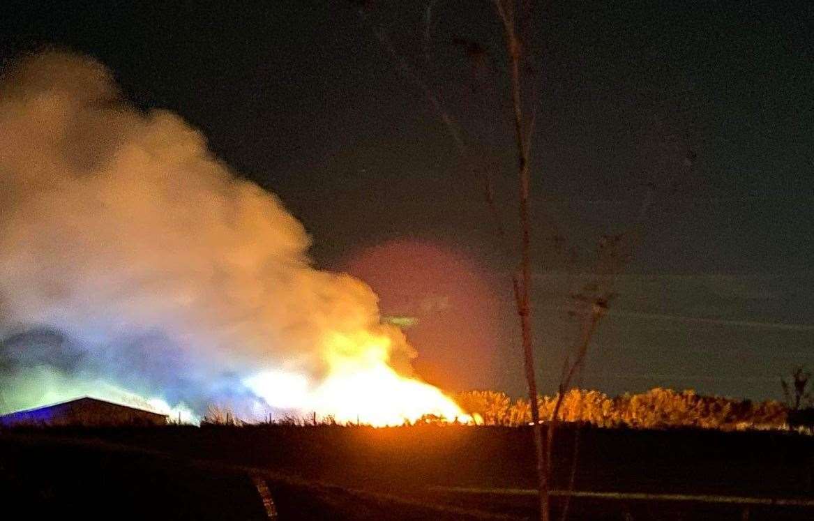 Firefighters have been tackling a hay bale fire near Foxhounds Lane in Gravesend overnight. Picture: Bella Rangecroft / Lacey Merton