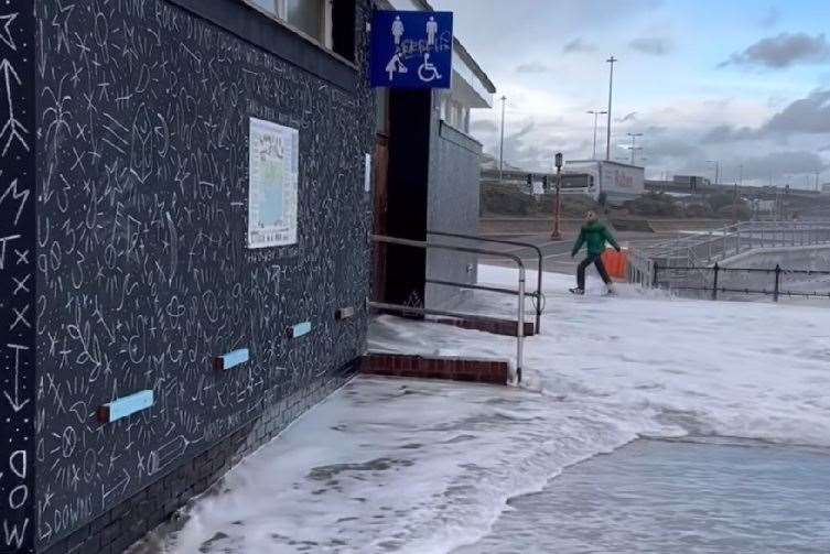 Happily the man was uninjured - albeit rather wet - after being hit by the wave. Picture: Rebels Coffee Dover / @rebels_dover on Instagram