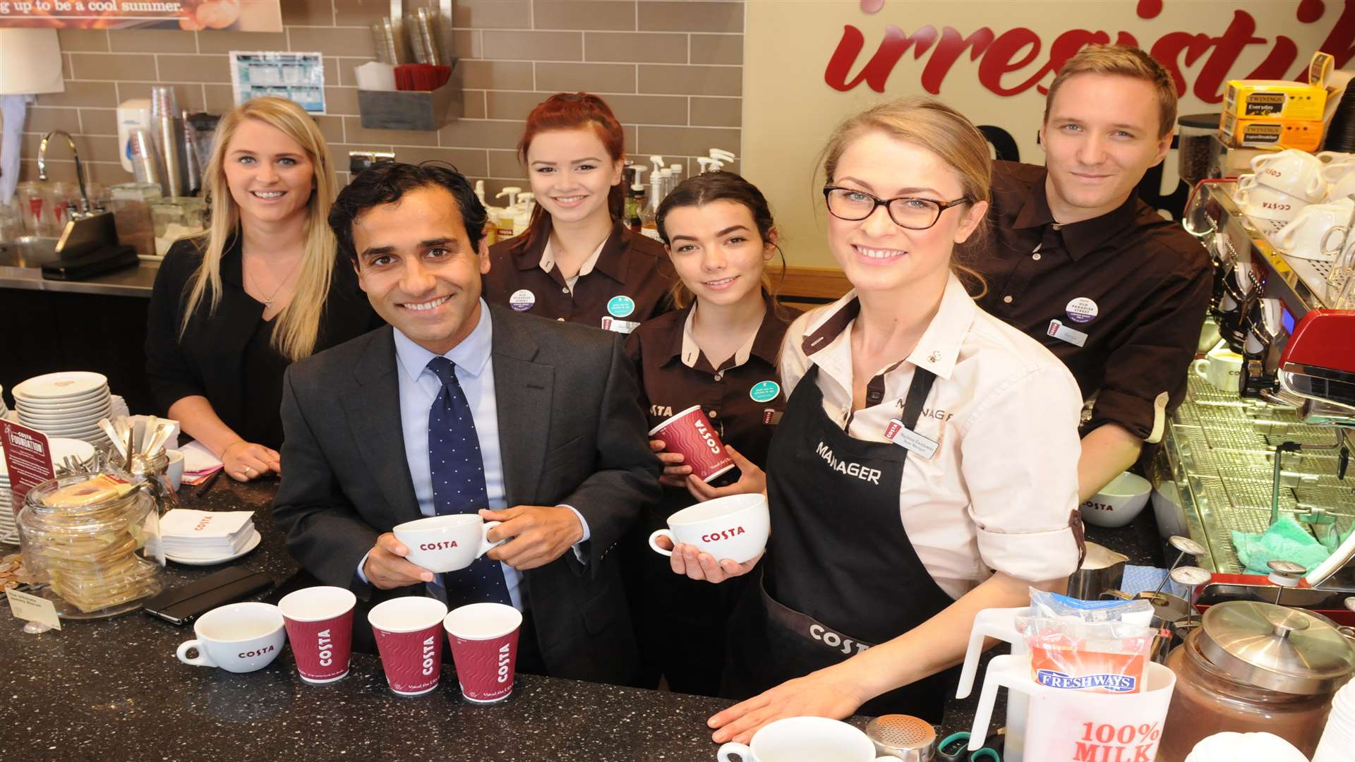 Manager, Magdalana Kwiatkowska with Rehman Chishti and staff.