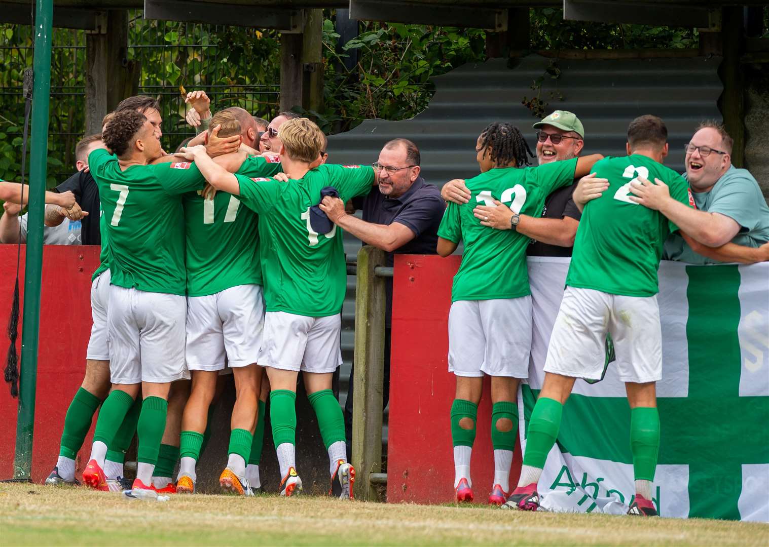 Ashford celebrate with travelling fans after Gary Lockyer's goal puts them 3-2 up. Picture: Ian Scammell