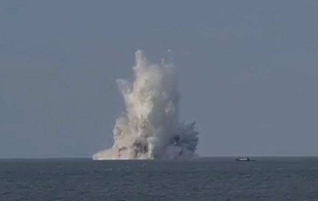 The moment huge waves rose from the sea as the bomb was set off. Picture: Lewis Wills