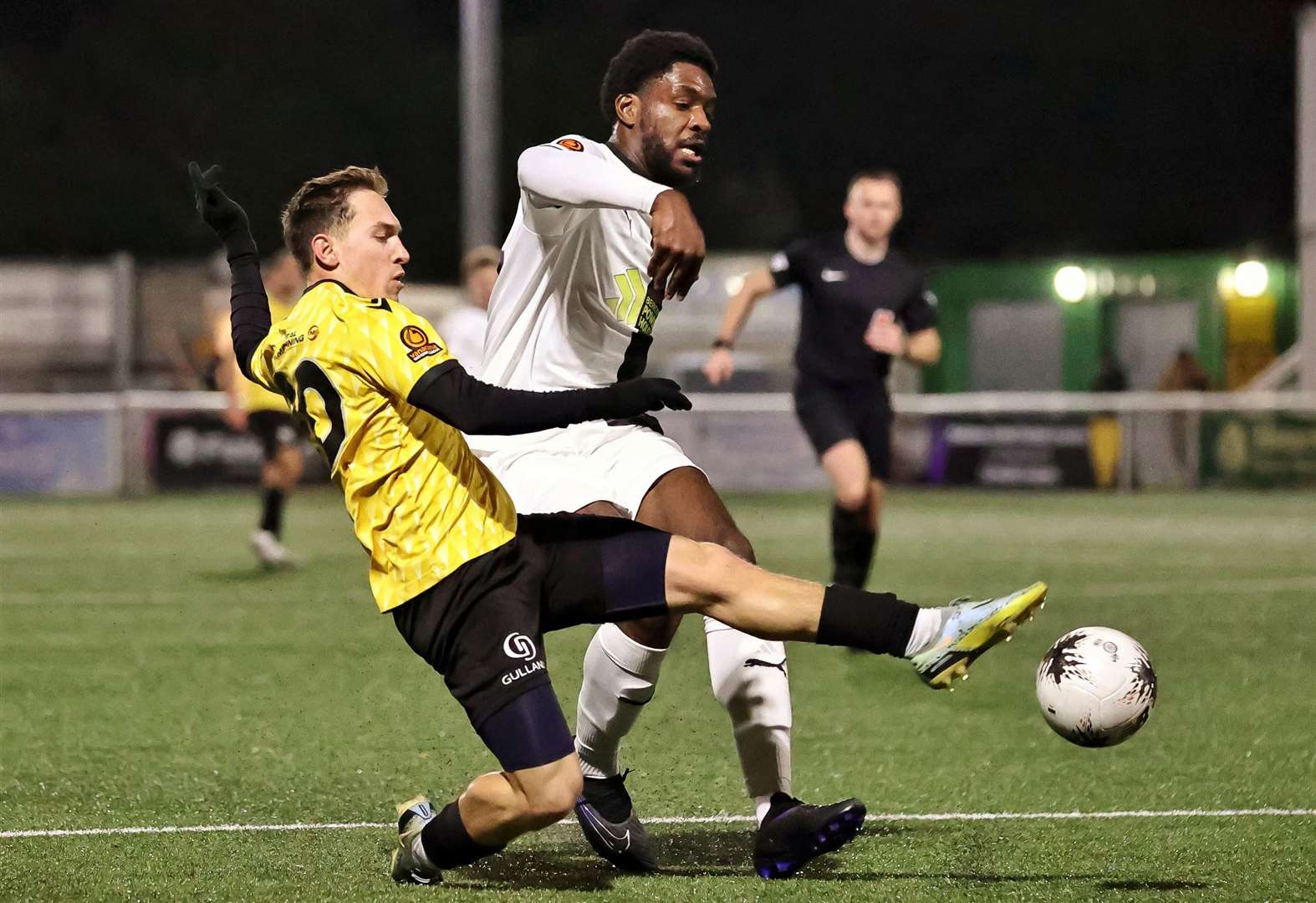 Matt Rush looks to get the better of Dartford centre-half Manny Adebowale. Picture: Helen Cooper