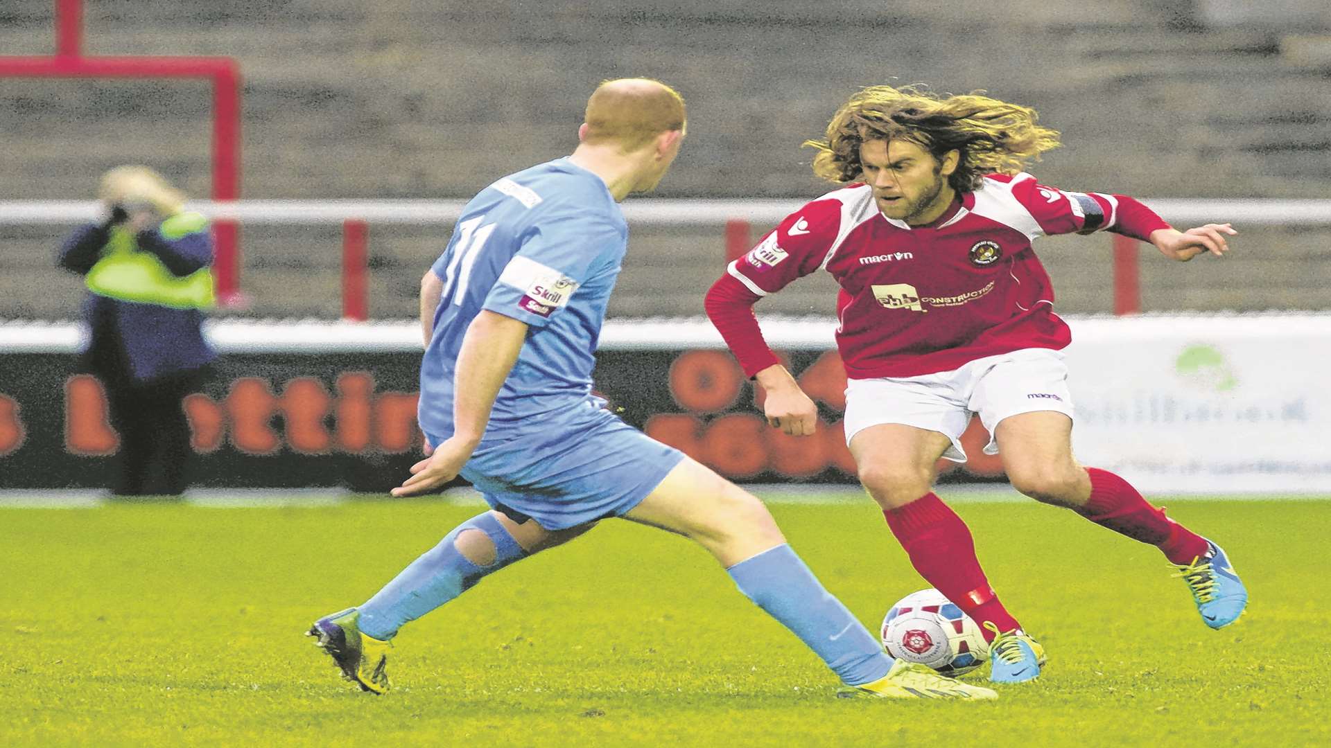 Daryl McMahon takes on Whitehawk's Tommy Fraser last season Picture: Andy Payton