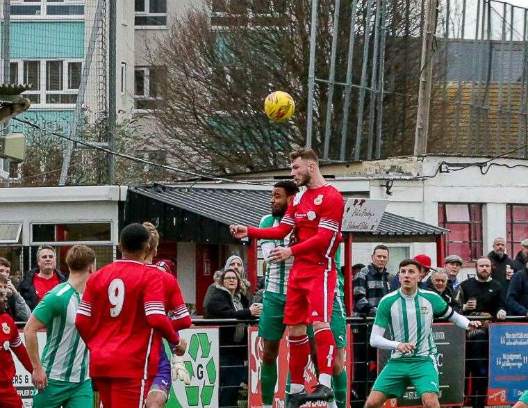 Cameron Chamberlain challenges for the ball in Whitstable's 3-0 weekend win over Sutton Athletic. Picture: Les Biggs