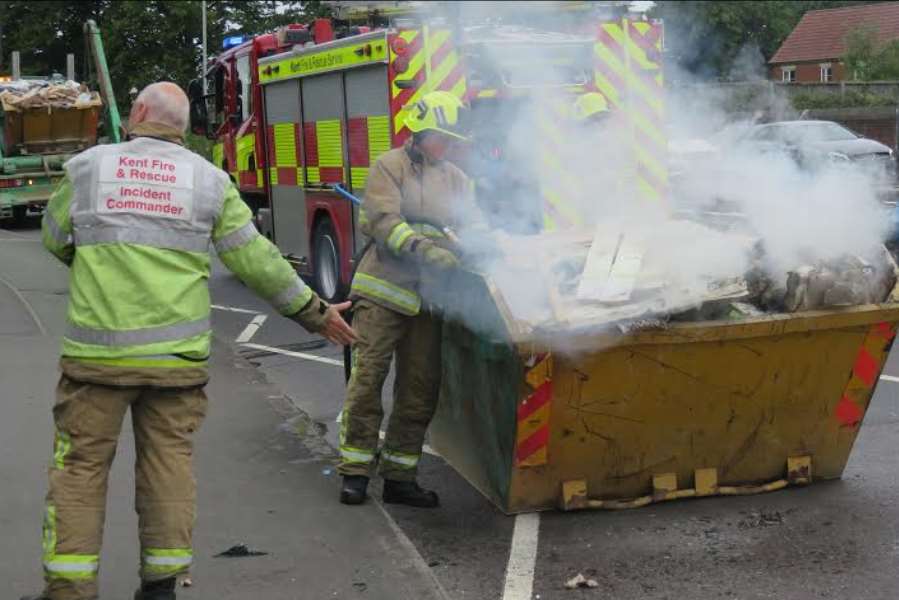 Firefighters doused the flames. Pic by Andy Clark