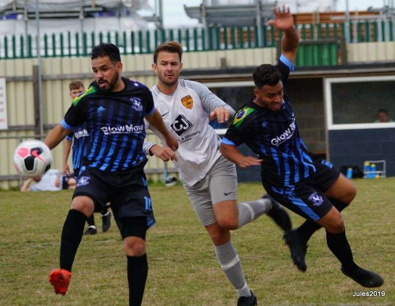 Leo Santos controlling the ball for Gillingham Town as Melqui Silva challenges. Picture: Julie Hoare