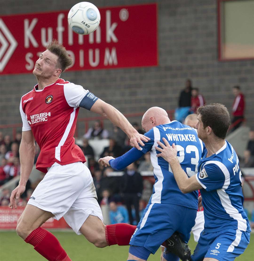 Dave Winfield heads on in the Macclesfield box. Picture: Andy Payton