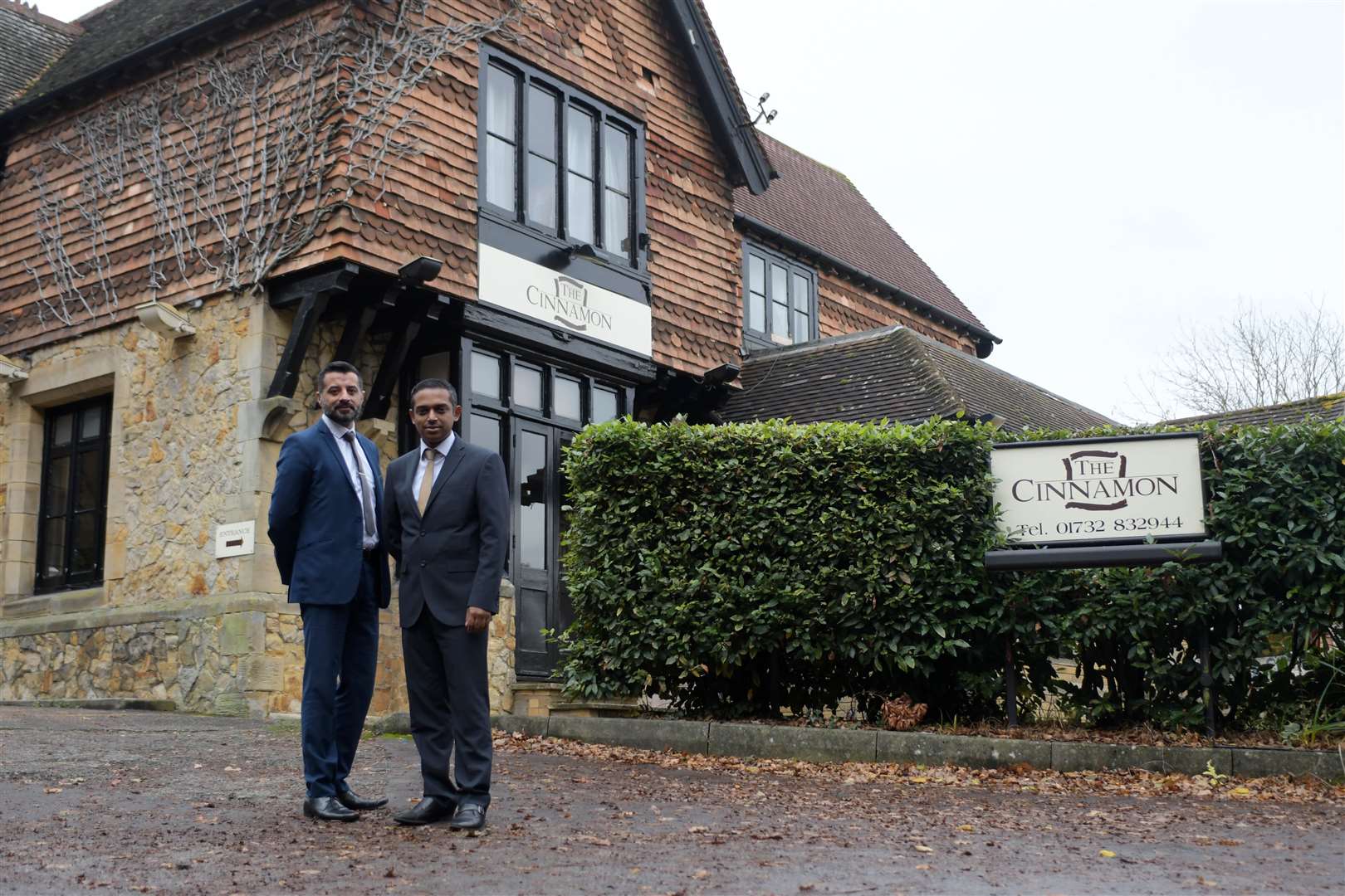 Sukh Majhail from Royal Bank of Scotland, left, with Cinnamon Square owner Habib Siddiq