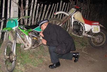 PC Jonathan Pollock of the Sittingbourne Neighbourhood Team examining one of the seized bikes. Pictures: KENT POLICE