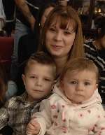 LITTLE UNCLE: Alfie Cribben, four, with his sister Emily, 19, and his niece Mia, 8months