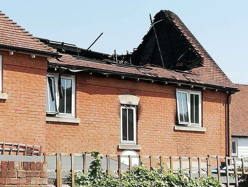 The first floor and roof of the home on Victory Drive Kings Hill has been destroyed by fire. Picture: Angela Scott