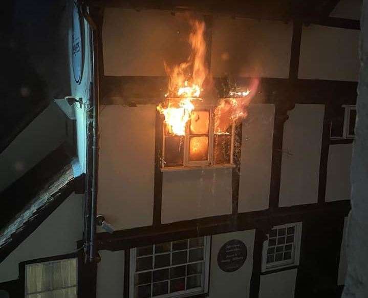 Fire bursting through the upper floor window. Picture: Tracey Crouch MP