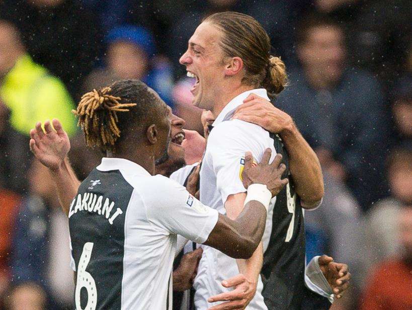 Tom Eaves celebrates his opener at Portsmouth Picture: Ady Kerry