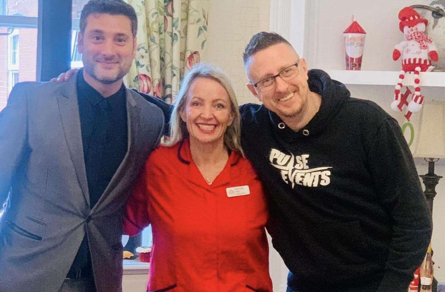 Michael Bublé tribute singer Jason Allen, wellbeing coordinator at Birkin Lodge Elizabeth Penman-Green, and Ian James from Bridge Radio. Picture: Birkin Lodge Care and Nursing Home