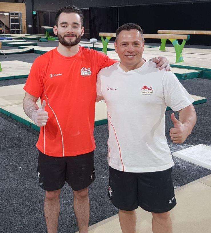 Pegasus gymnast James Hall with coach Ionut Trandaburu