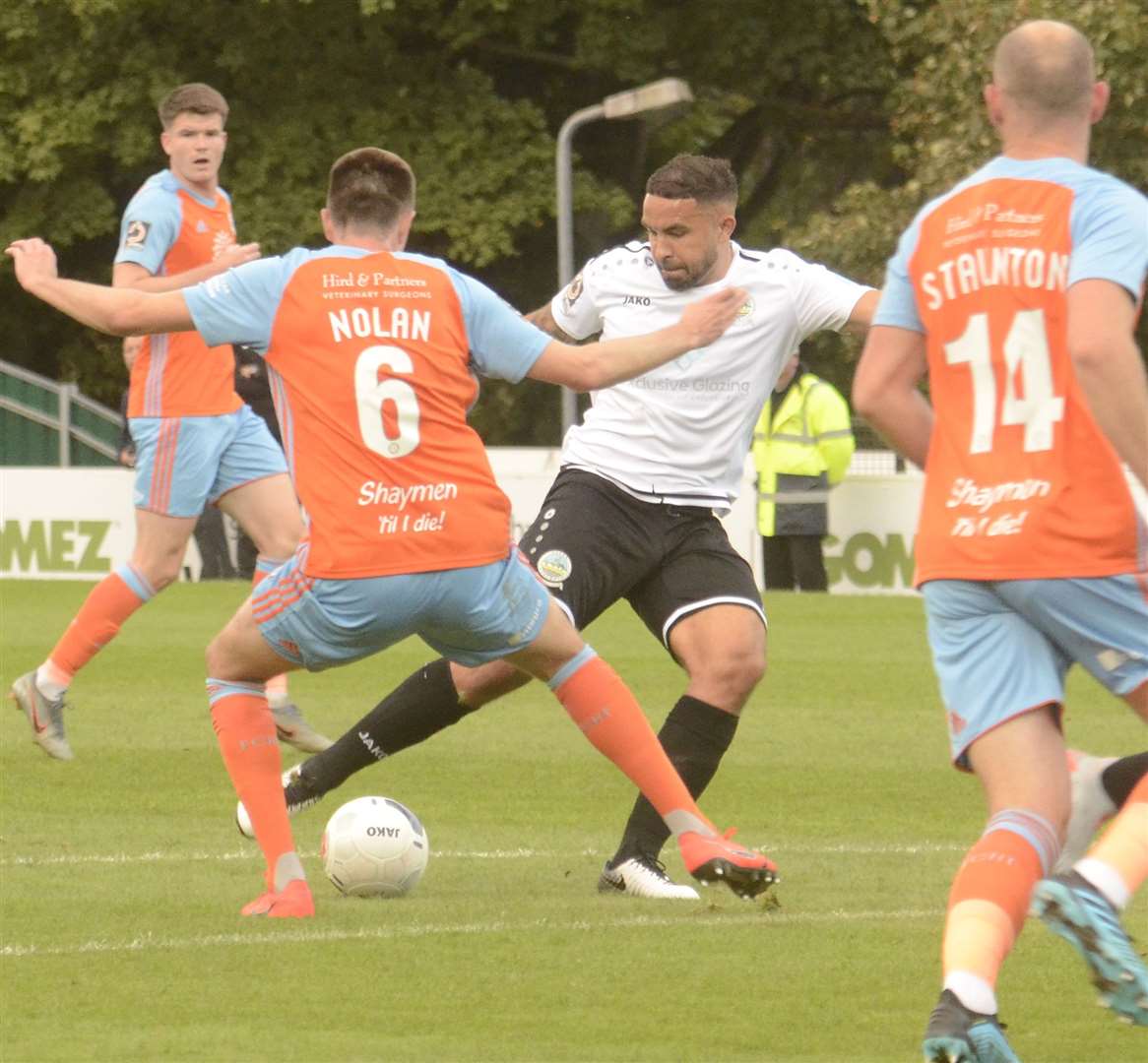 Dover's Jai Reason in the thick of things against FC Halifax on Saturday Picture:Chris Davey