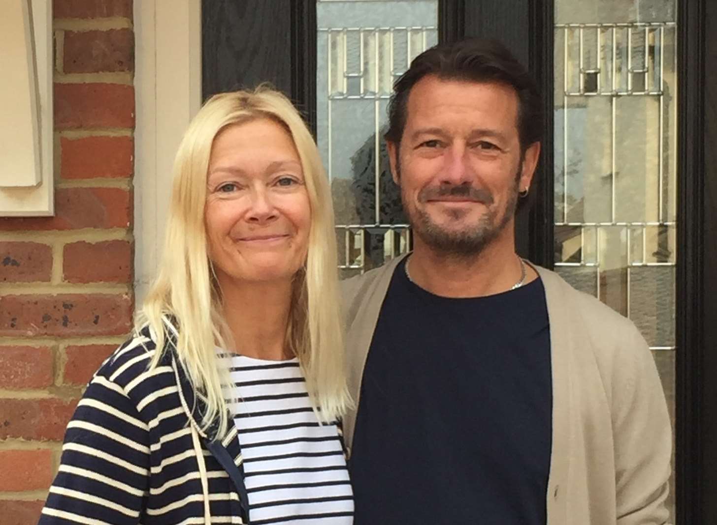 Ian and Annabel Lichfield outside their holiday rental